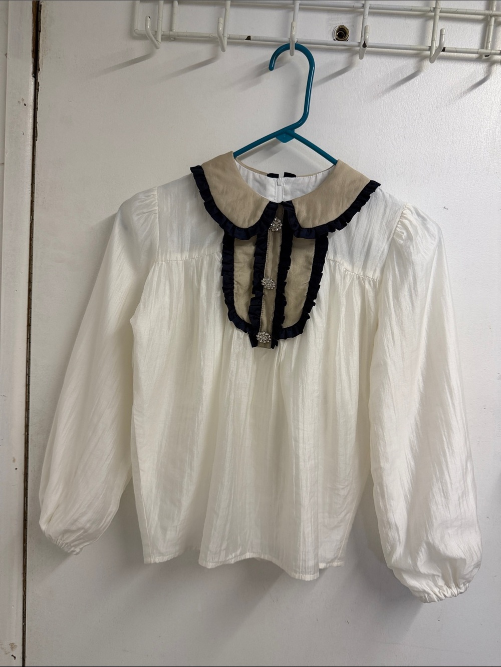 White Blouse with Contrasting Collar and Ruffle Bib